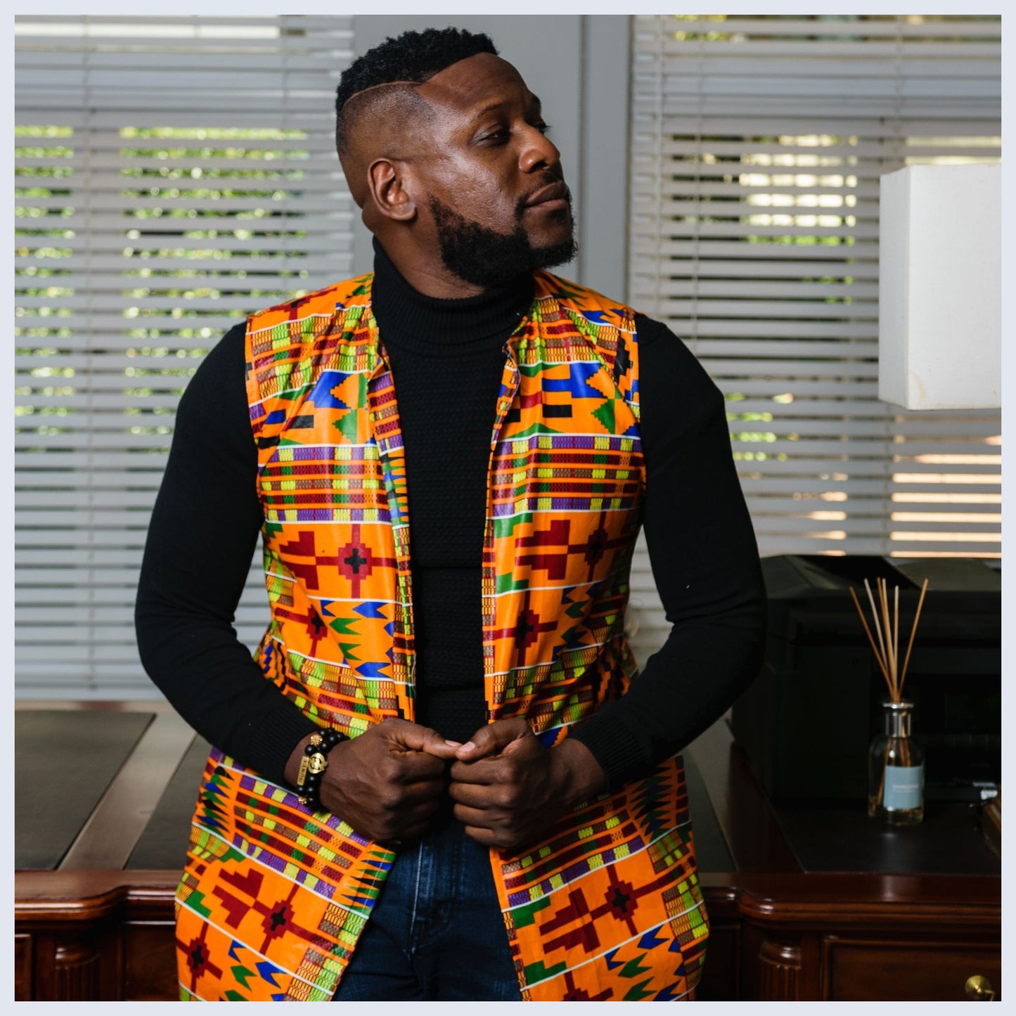 Kente Overcoat by Tribe Afrique. Tribe Afrique