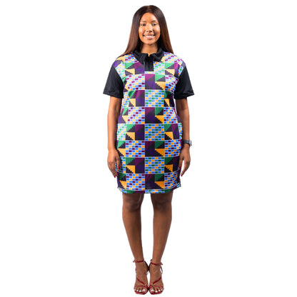 Woman wearing a colorful geometric patterned Kente Golfer dress on a white background